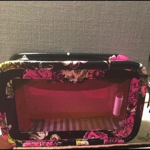 Victoria’s Secret cosmetic bag.